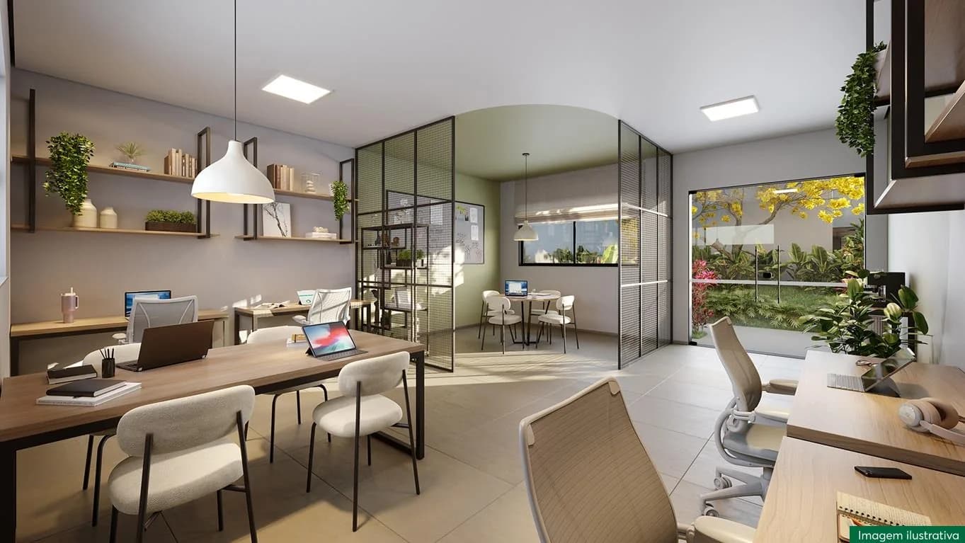 Sala de estudos com mesas compartilhadas e luminárias
